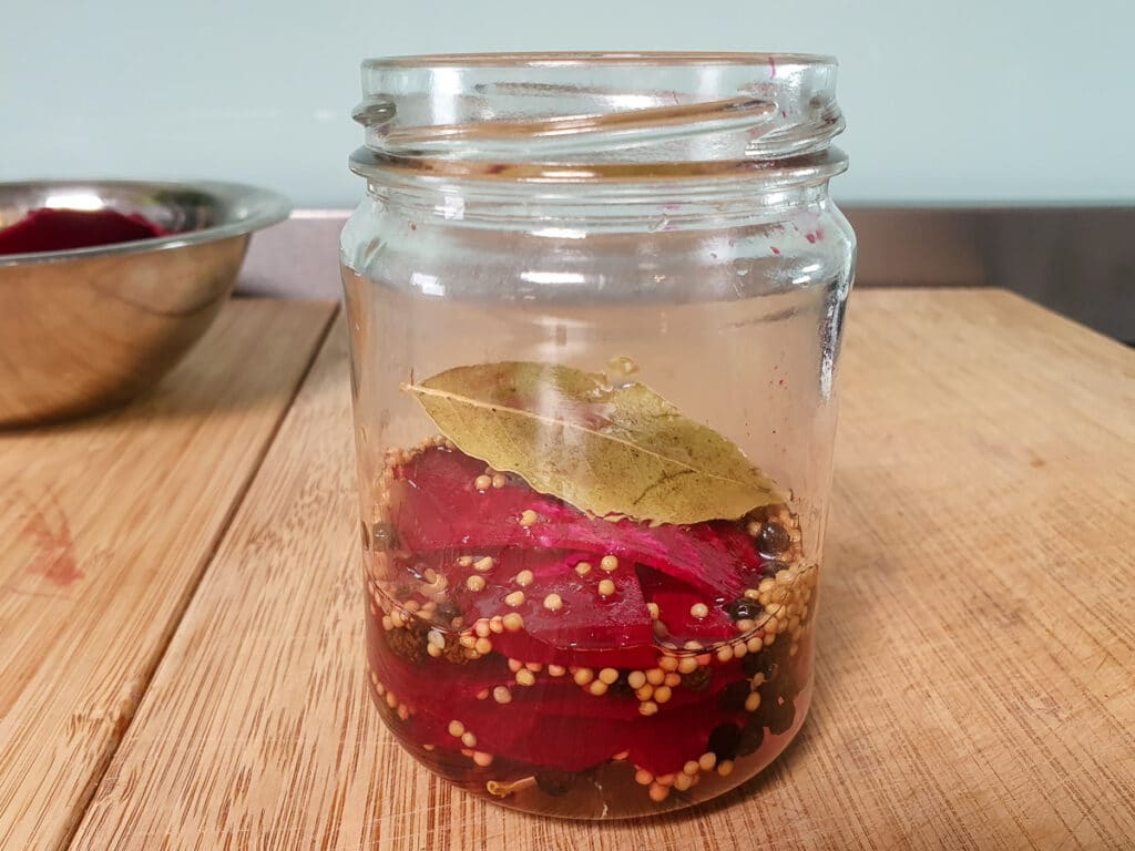 Refrigerator pickled beets 12 Side view first layer beets and pickling liquid.