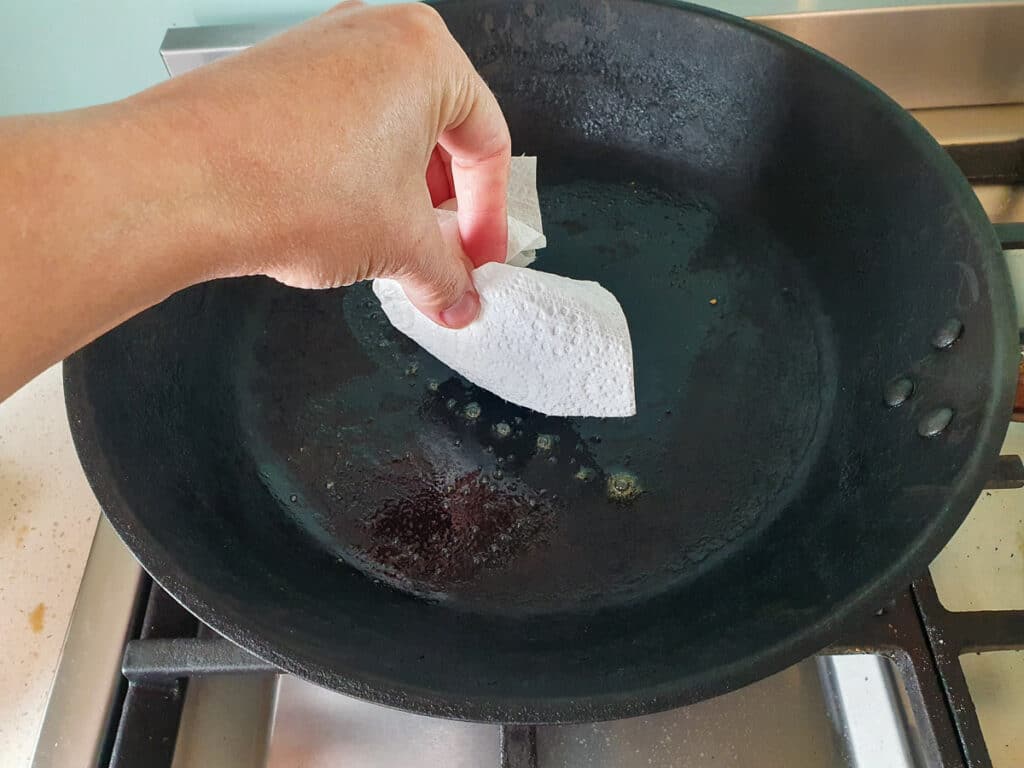 Banana pikelets 10 Wiping out first bit of butter carefully with a piece of paper towl.