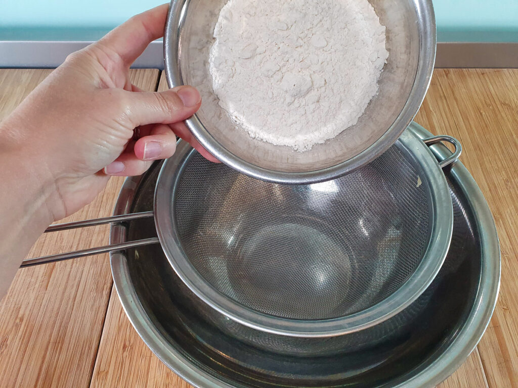 Banana pikelets 3 Sifting flour.