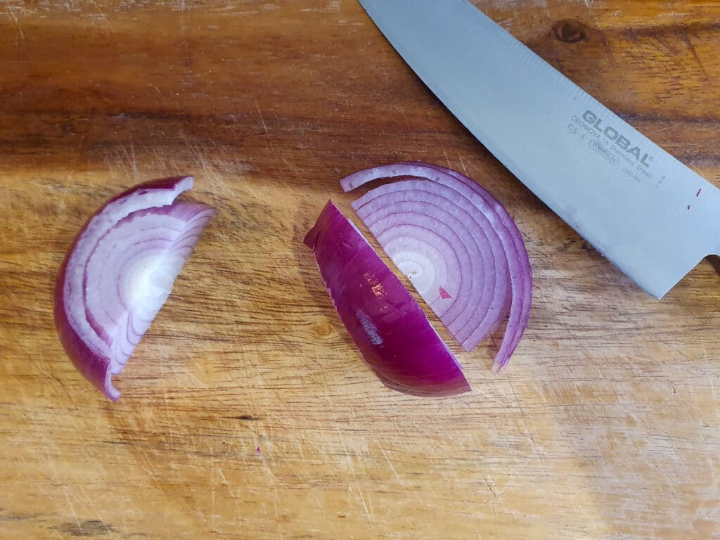 Beetroot salad 7 Finely slicing red onion.