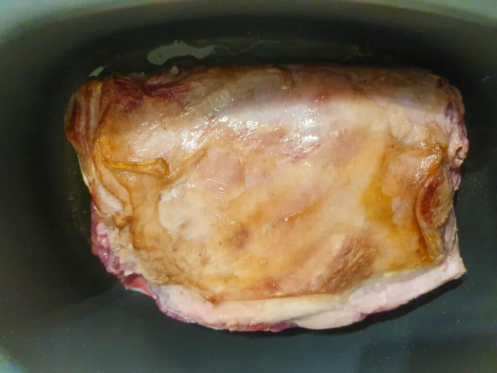 Slow cooker lamb shoulder 7 Browning the lamb on the bottom side.