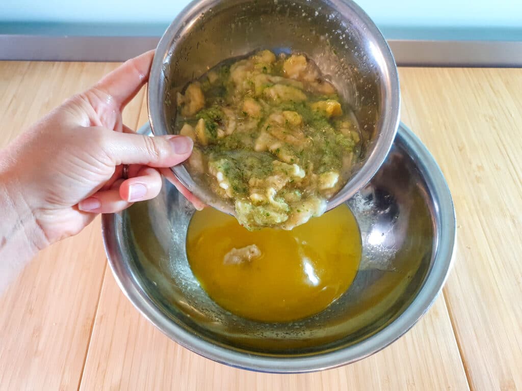 Feijoa muffins 11 Adding feijoa pulp to rest of wet ingredients.