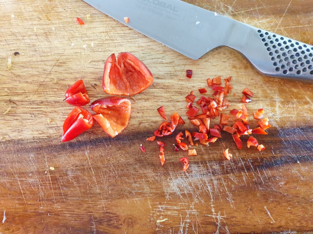 Feijoa chutney 7 Deseeding and finely slicing chilli.