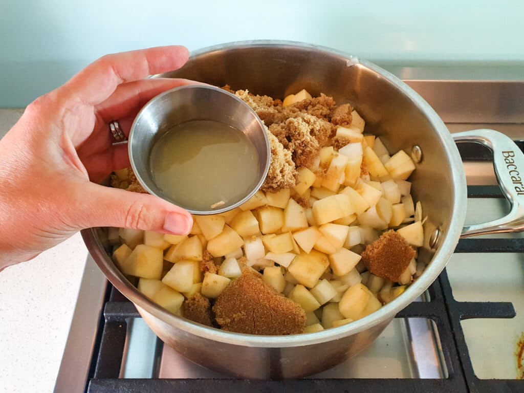 Feijoa chutney 10 Adding lemon juice to pot.