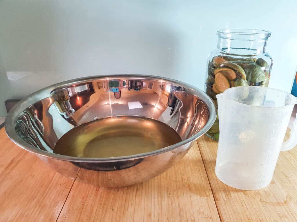 Feijoa fizz 8 Large bowl of strained fizz after initial brew, ready to add extra sugar and yeast to.