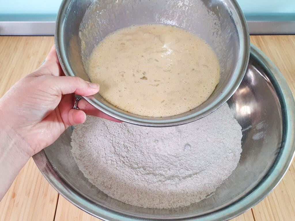 Feijoa loaf 13 Adding wet ingredients to dry ingredients.
