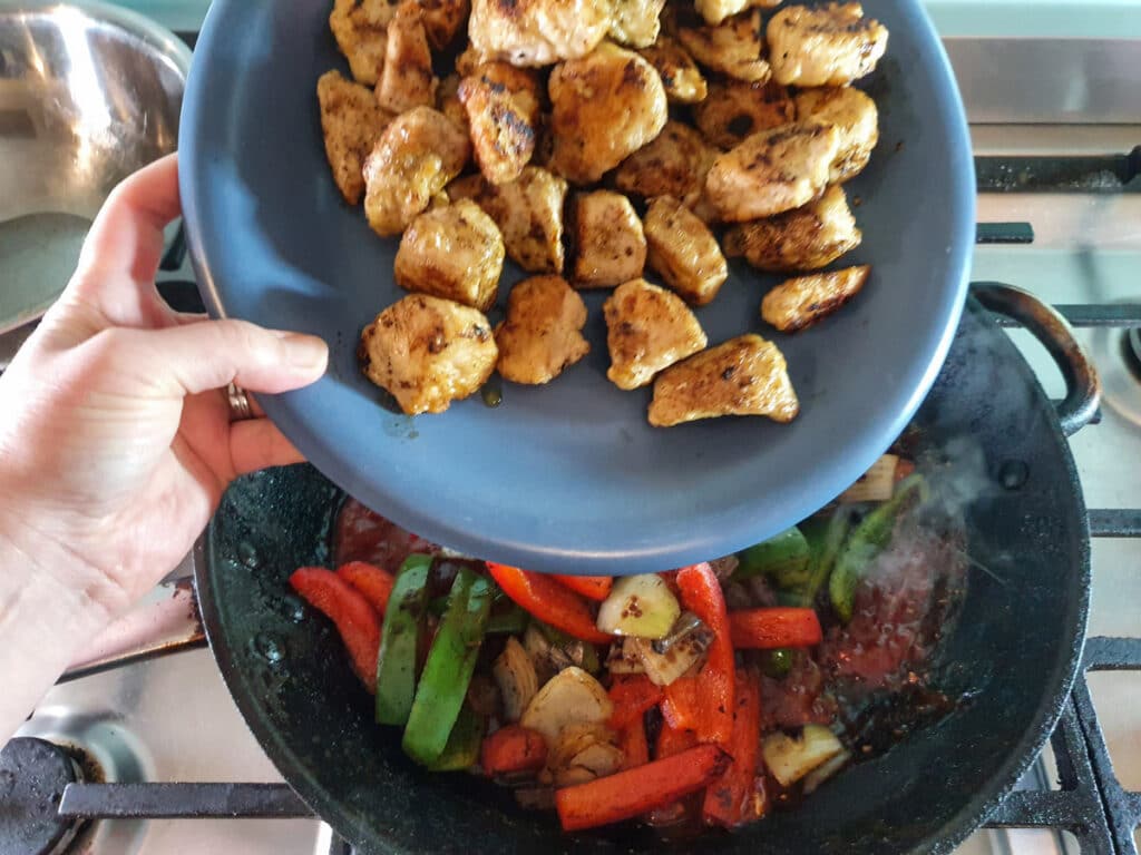 Chilli Chicken Gravy 20 Adding cooked chicken back into gravy.