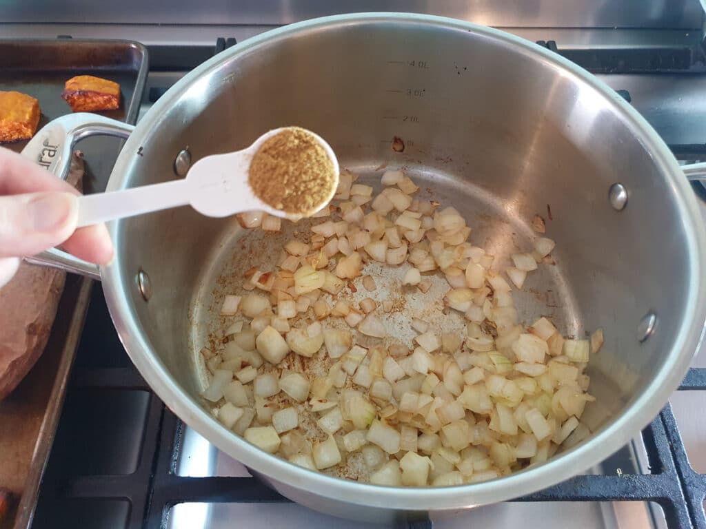 Pumpkin and Sweet Potato Soup 9 Adding ground cumin.