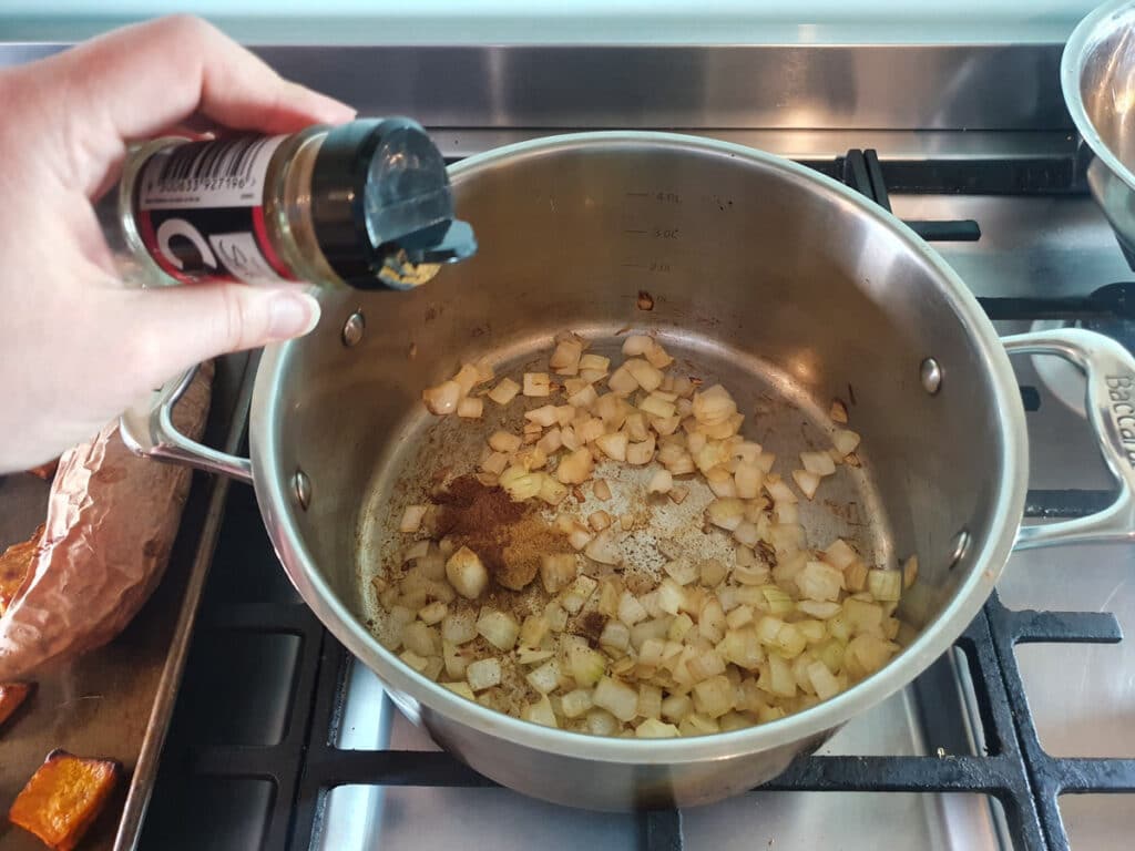 Pumpkin and Sweet Potato Soup 11 Adding the cayenne pepper.