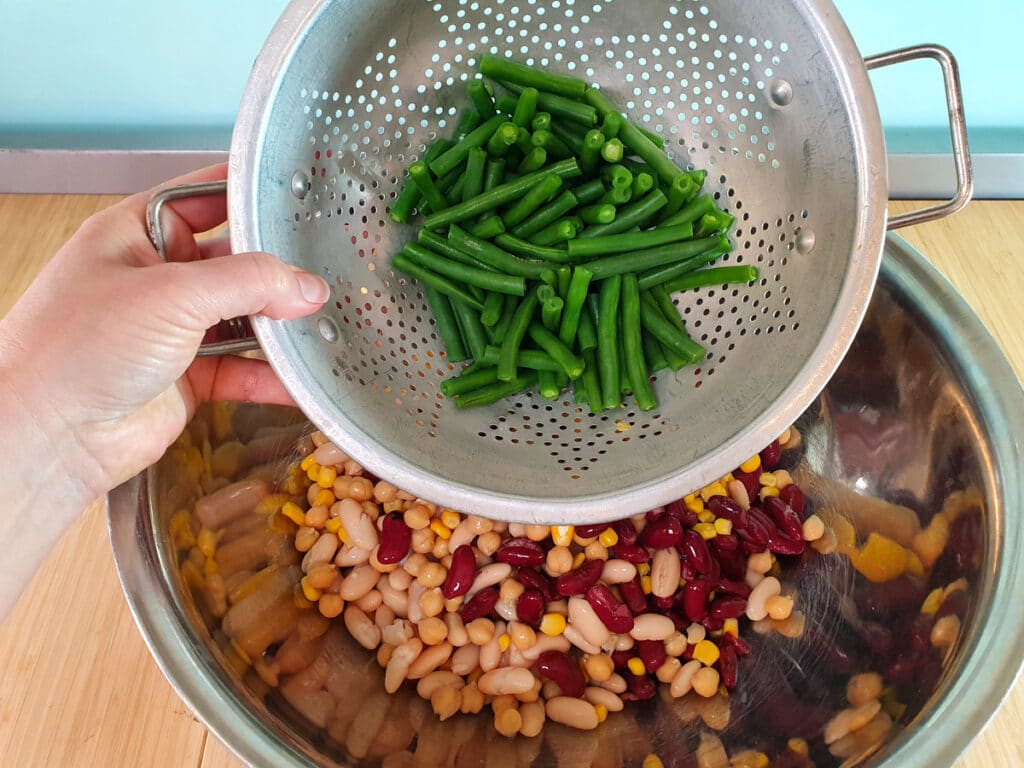 Four Bean Salad 9 Adding cooked green beans.