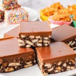 Hedgehog Slice 9 Close up shot of pieces of hedgehog slice, with party food in the background.